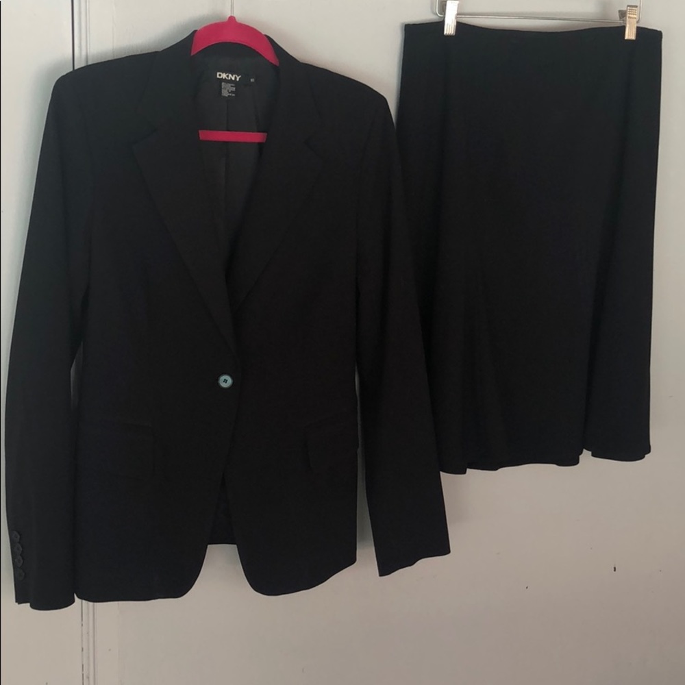 Black suit: jacket and flaired knee length skirt
